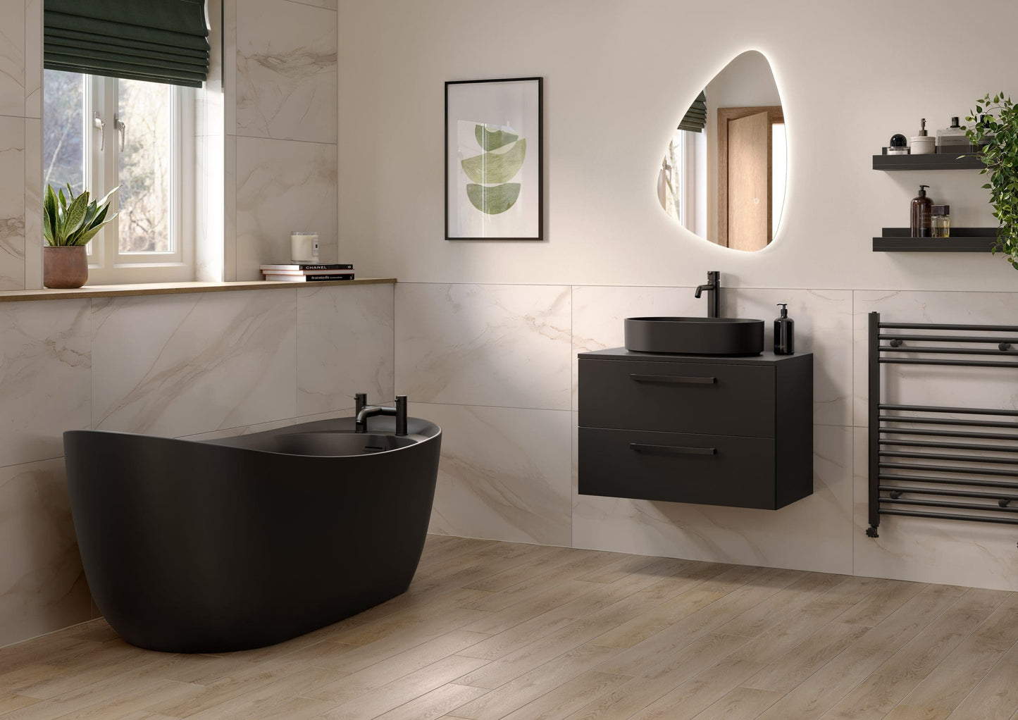 Frontline AquaKast Ophelia black freestanding bathtub with smooth curves and modern design, shown in a bathroom setting.