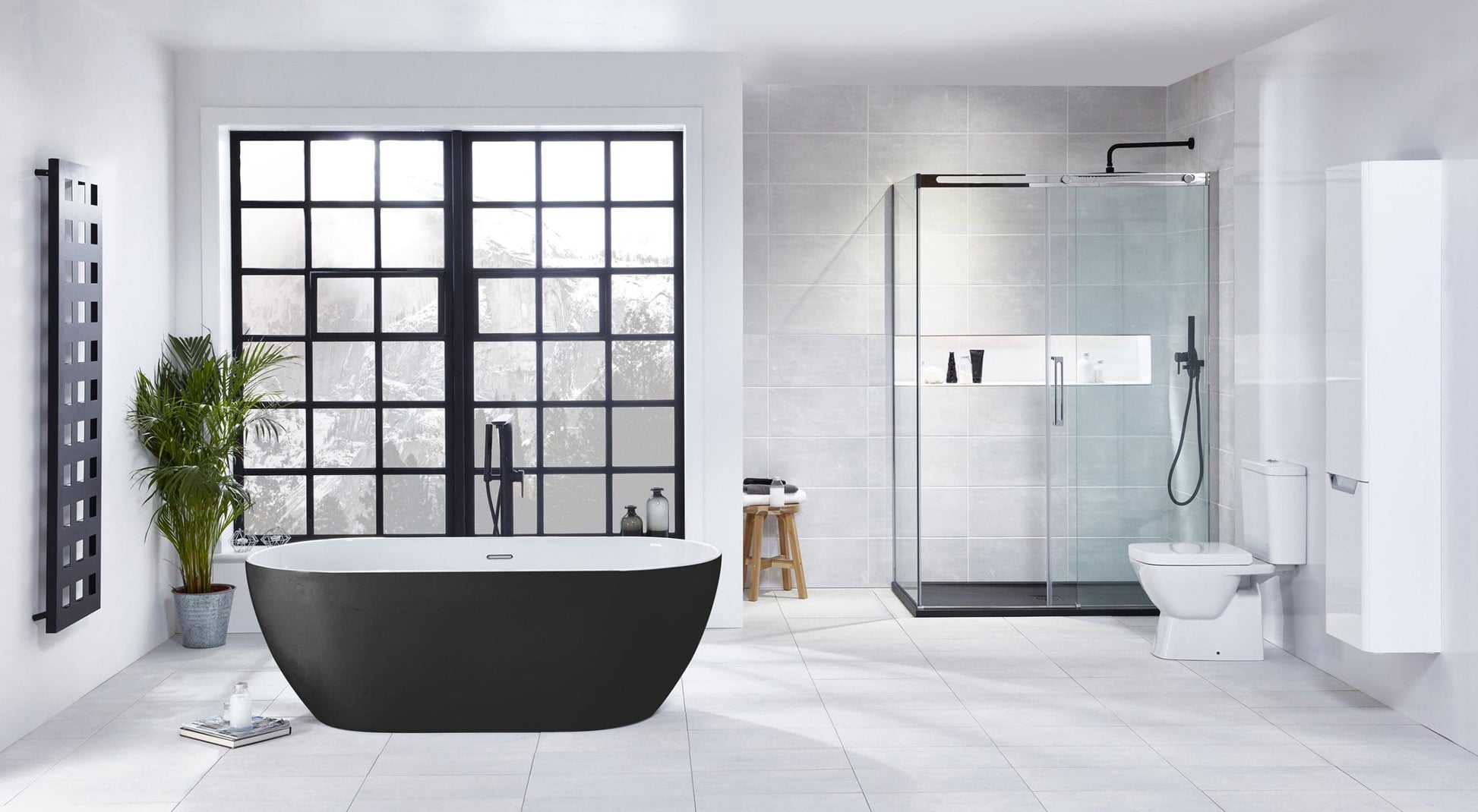 Frontline AquaKast Graphite Summit freestanding bathtub with sleek design, measuring 1680 x 800mm, shown in a modern bathroom setting.