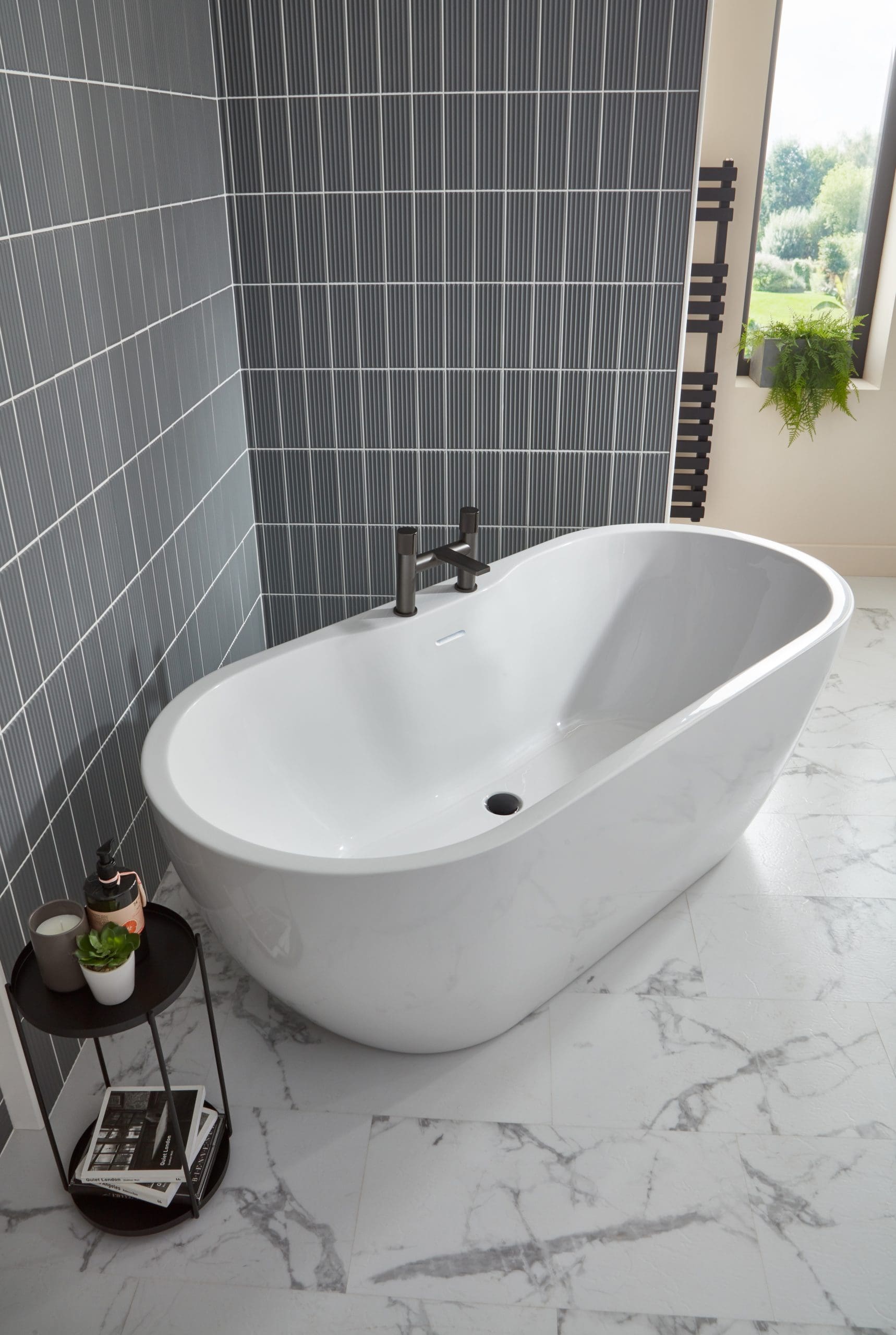 Frontline AquaKast Florence freestanding bathtub in a modern bathroom, showcasing its sleek design and spacious interior.