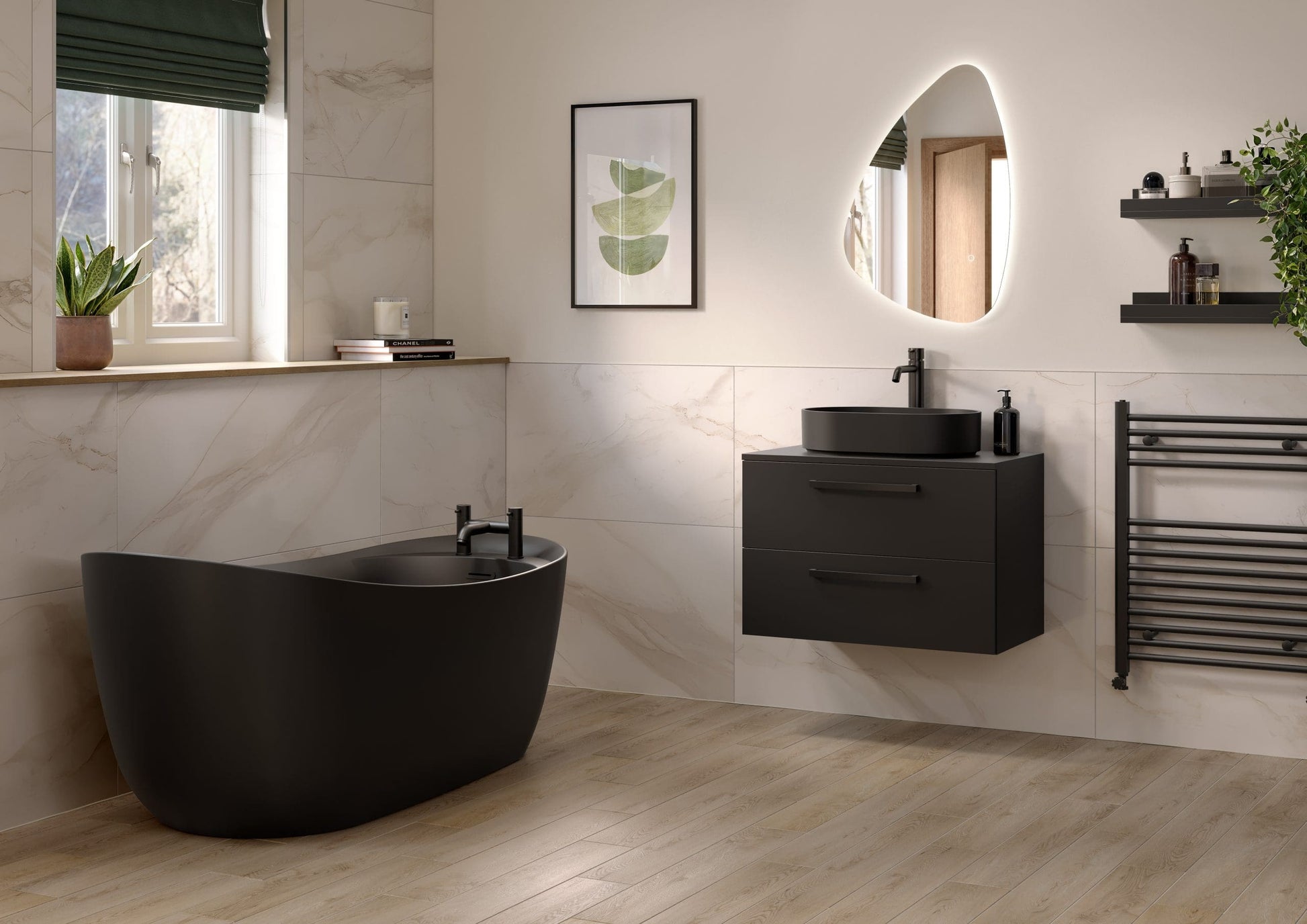 Frontline AquaKast Ophelia black freestanding bathtub with smooth curves and modern design, shown in a bathroom setting.
