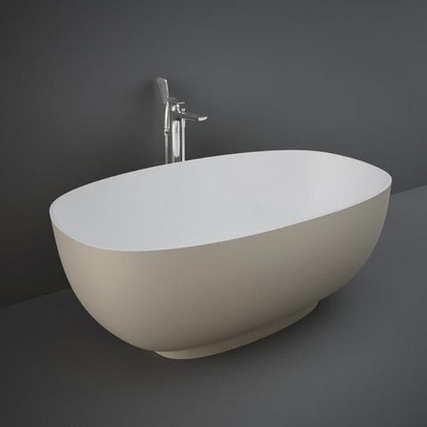 Gray RAK Cloud freestanding bathtub with smooth curves and modern design, shown from a side angle in a bathroom setting.